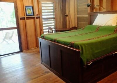 Bedroom 3 with under bed storage. Queen Bed. First floor.